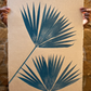 Botanical palm print in blue made from natural fiber paper.