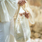 Handwoven crossbody travel bag in ivory