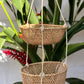 Hanging handwoven two tiered basket.