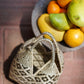 Geometric black and white mini woven basket bag