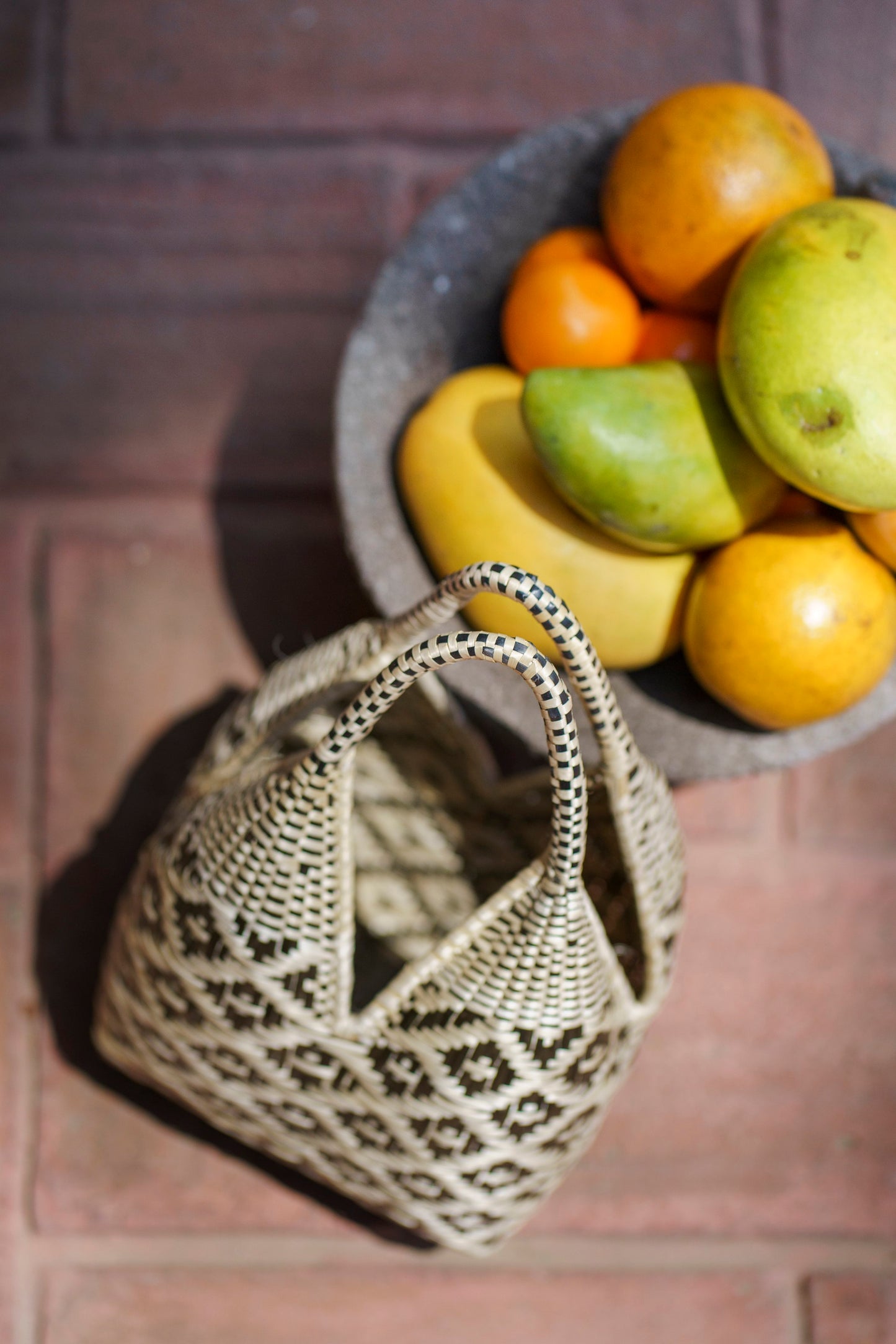 Geometric black and white mini woven basket bag